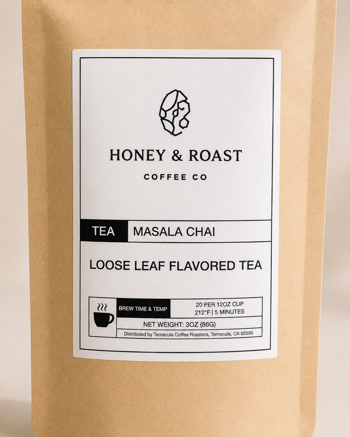 A 3 oz kraft paper stand-up pouch of Honey & Roast Coffee Co. Masala Chai Loose Leaf Tea, featuring a clean white label with black text and graphics.
